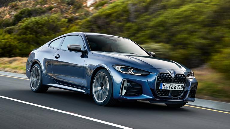 2022 BMW M440i in blue driving